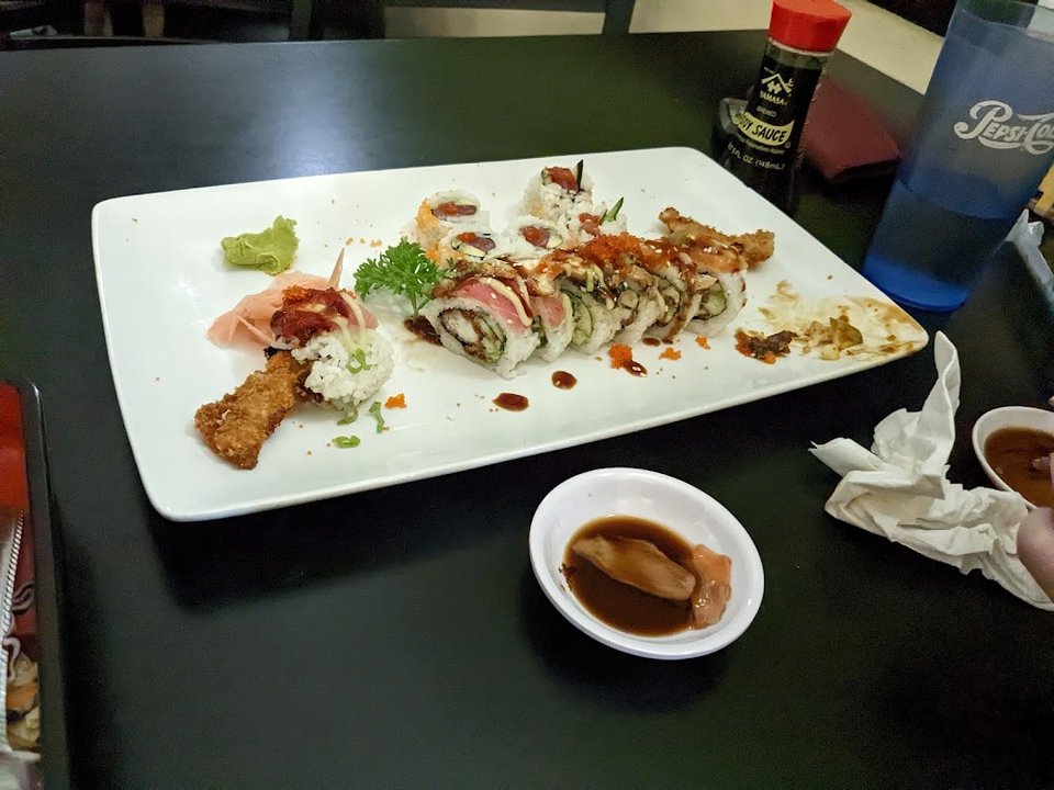 Appetizers and bento box selections on display.
