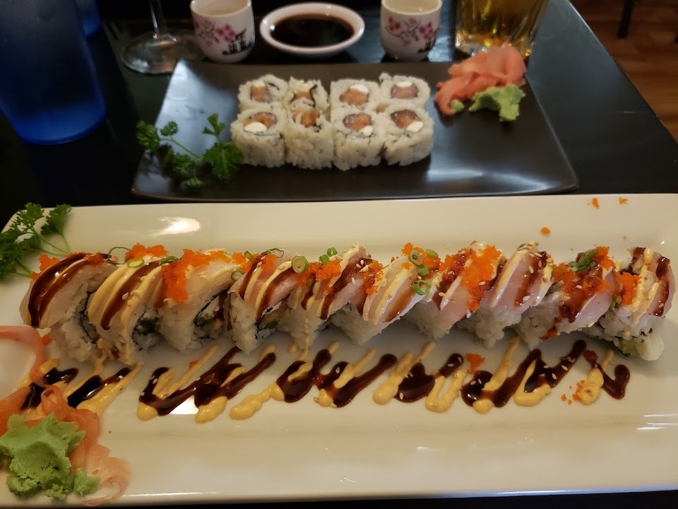 Menu page with sushi, sashimi, and nigiri sections.