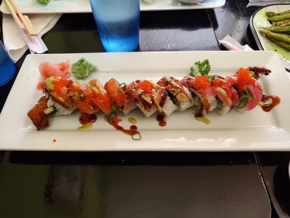 Menu page with sushi, sashimi, and nigiri sections.
